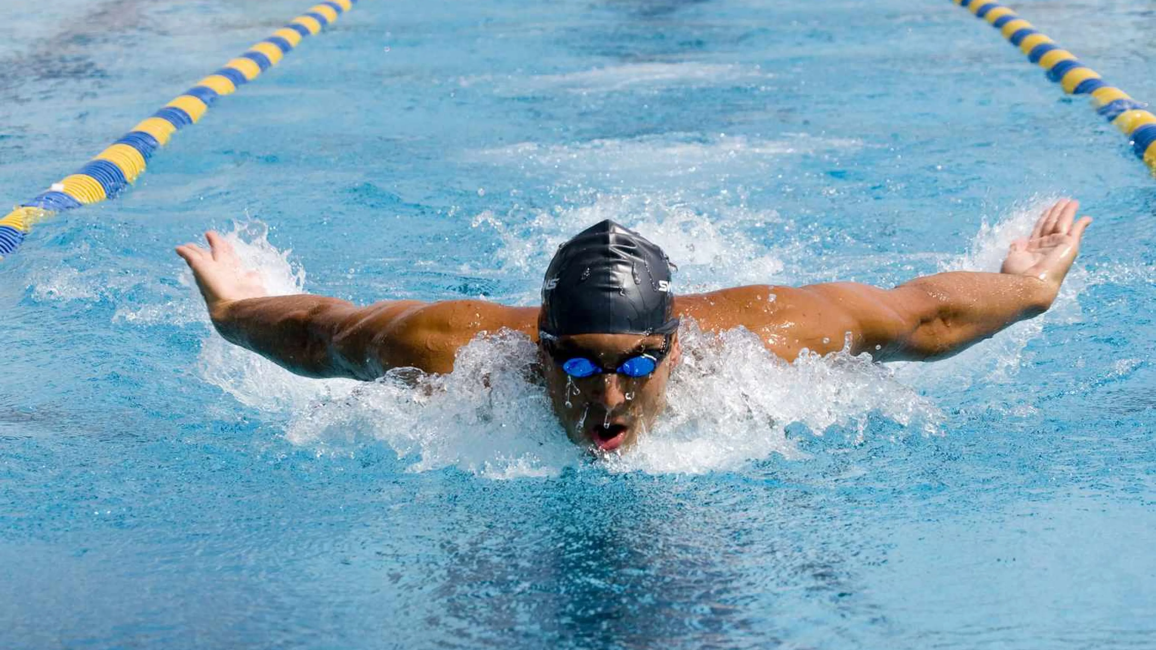 Man Swimming in pool